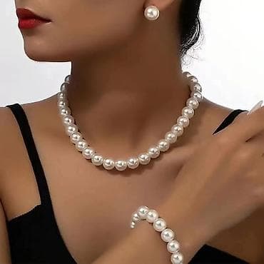 Elegantan set biserne bižuterije – ogrlica, narukvica i minđuše - na lalafo.rs — 1 Elegantan set biserne bižuterije – ogrlica, narukvica i minđuše - — 1