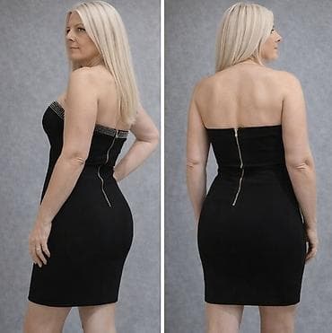 Elegantna crna mini haljina bez bretela - Kroj: uska silueta koja na lalafo.rs Elegantna crna mini haljina bez bretela - Kroj: uska silueta koja