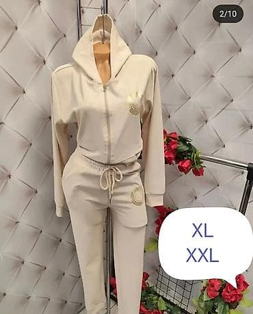 Ženski komplet trenerke sa kapuljačom - Dvodni set: gornji deo na na lalafo.rs — 1 Ženski komplet trenerke sa kapuljačom - Dvodni set: gornji deo na — 1