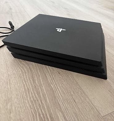 Sony PlayStation 4 Pro konzola, elegantnog crnog dizajna, nudi at lalafo.rs — 2 Sony PlayStation 4 Pro konzola, elegantnog crnog dizajna, nudi — 2