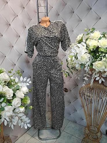 Ženski komplet – majica i pantalone sa leopard uzorkom Opis: - na lalafo.rs Ženski komplet – majica i pantalone sa leopard uzorkom Opis: -