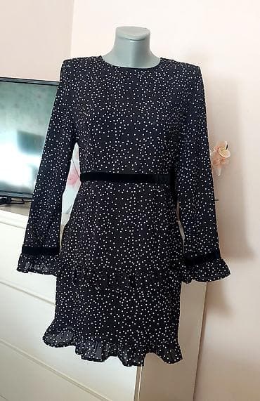 Crna mini haljina sa belim tufnama - Kroj: A-linija, dužina iznad na lalafo.rs Crna mini haljina sa belim tufnama - Kroj: A-linija, dužina iznad