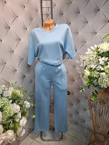 pantalone gina benotti: Dvodelni ženski komplet – majica i pantalone širokog kroja - Model na lalafo.rs — 2 pantalone gina benotti: Dvodelni ženski komplet – majica i pantalone širokog kroja - Model — 2
