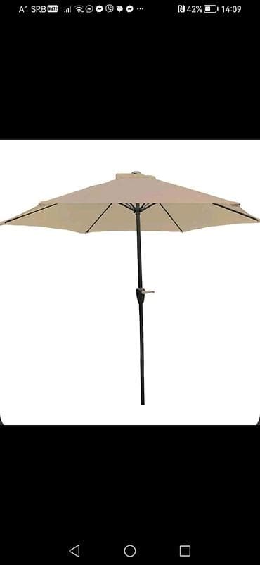 Baštenski suncobran sa bež platnom, idealan za zaštitu od sunca u na lalafo.rs — 1 Baštenski suncobran sa bež platnom, idealan za zaštitu od sunca u — 1