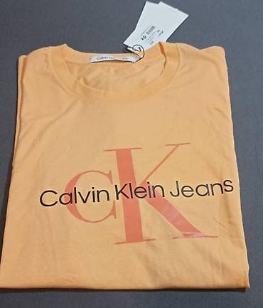 Calvin Klein Jeans narandžasta majica XXL 2390din,nova, original - na lalafo.rs — 1 Calvin Klein Jeans narandžasta majica XXL 2390din,nova, original - — 1