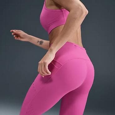 NIKE Swift Women's High-Waisted 7/8
Running Leggings with Pockets vel na lalafo.rs — 4 NIKE Swift Women's High-Waisted 7/8
Running Leggings with Pockets vel — 4