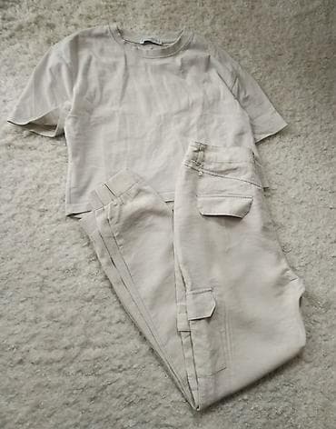 Cargo pantalone duboke tanke u kremkastoj puder boji dubokog struka sa na lalafo.rs — 2 Cargo pantalone duboke tanke u kremkastoj puder boji dubokog struka sa — 2