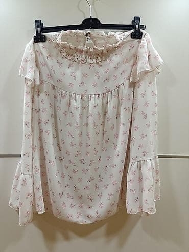 zenske broj: Elegantna ženska bluza, bele boje sa diskretnim cvetnim dezenom u roze at lalafo.rs — 1 zenske broj: Elegantna ženska bluza, bele boje sa diskretnim cvetnim dezenom u roze — 1