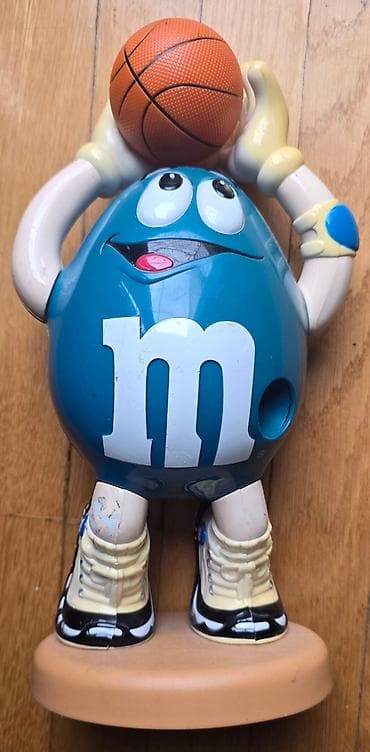 MM - M&M bonbone se ubace, i kad se povuce ruka ispadaju. Igracka na lalafo.rs — 4 MM - M&M bonbone se ubace, i kad se povuce ruka ispadaju. Igracka — 4