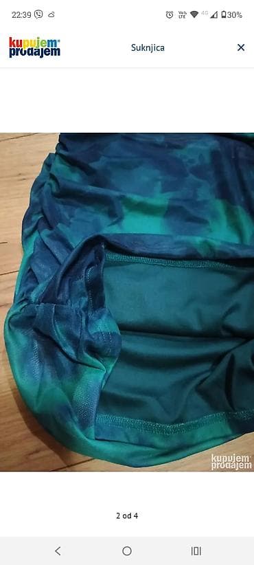 Ova ženska mini suknja kombinuje plave i zelene tonove u efektu na lalafo.rs — 3 Ova ženska mini suknja kombinuje plave i zelene tonove u efektu — 3