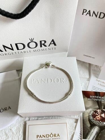 I. 12. Pandora narukvica Vel:21cm Cena:2100din (Samo narukvica) na lalafo.rs I. 12. Pandora narukvica Vel:21cm Cena:2100din (Samo narukvica)