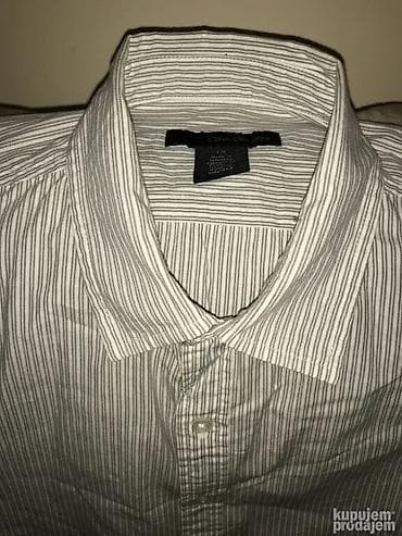 Original Calvin Klein kosulja L 100% extra fine cotton Ramena oko na lalafo.rs — 4 Original Calvin Klein kosulja L 100% extra fine cotton Ramena oko — 4