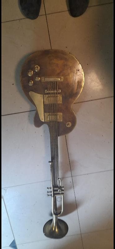 BRONZA. Dekorativna skulptura/instrument hibrid – gitara i truba u na lalafo.rs — 1 BRONZA. Dekorativna skulptura/instrument hibrid – gitara i truba u — 1