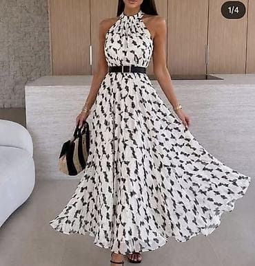 Haljina maxi dužine sa halter izrezom i printom. - Elegantna duga na lalafo.rs Haljina maxi dužine sa halter izrezom i printom. - Elegantna duga