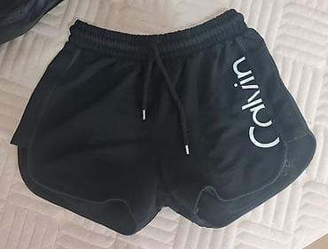 Calvin Klein Jeans ženske šorts trenerke - Model na lalafo.rs — 1 Calvin Klein Jeans ženske šorts trenerke - Model — 1