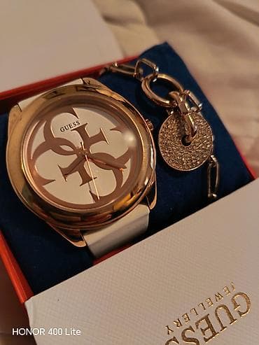 GUESS ženski set – sat i narukvica original - Modni sat sa velikim at lalafo.rs — 1 GUESS ženski set – sat i narukvica original - Modni sat sa velikim — 1