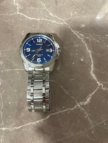 Casio muški ručni sat sa plavim brojčanikom - Kućište i narukvica od na lalafo.rs — 1 Casio muški ručni sat sa plavim brojčanikom - Kućište i narukvica od — 1