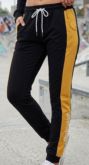 Ženske trenerke/jogger pantalone – crno-žute - Dizajn: crna osnova sa na lalafo.rs Ženske trenerke/jogger pantalone – crno-žute - Dizajn: crna osnova sa
