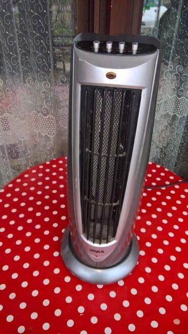 Keramičke grejalice: VIVAX keramička grejalica CH-2000Mini Heater prenos na mobilna na lalafo.rs — 1 Keramičke grejalice: VIVAX keramička grejalica CH-2000Mini Heater prenos na mobilna — 1