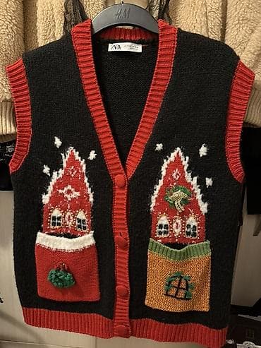 dve suknje po: Zara(novi)pleteni prsluk bez rukava sa prazničnim motivima. - Model na lalafo.rs — 1 dve suknje po: Zara(novi)pleteni prsluk bez rukava sa prazničnim motivima. - Model — 1
