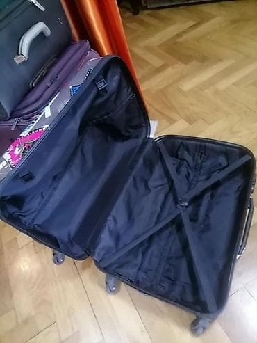 Travel suitcases and bags: Kofer veliki tvrdi šarene boje na 4 točkića oko 65 /40 /25 . sve at lalafo.rs — 9 Travel suitcases and bags: Kofer veliki tvrdi šarene boje na 4 točkića oko 65 /40 /25 . sve — 9