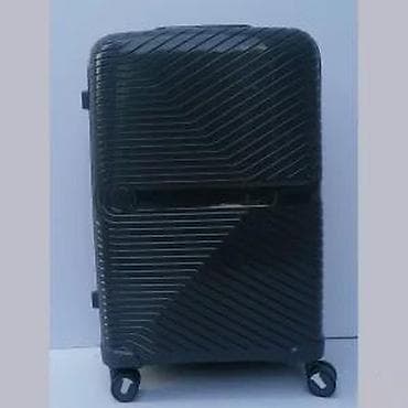 Travel suitcases and bags: Tvrdi kofer na točkiće, tamnosive boje, sa modernom žljebastom at lalafo.rs — 10 Travel suitcases and bags: Tvrdi kofer na točkiće, tamnosive boje, sa modernom žljebastom — 10