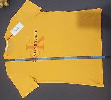 Calvin Klein Jeans narandžasta majica XXL 2390din,nova, original - na lalafo.rs — 2 Calvin Klein Jeans narandžasta majica XXL 2390din,nova, original - — 2