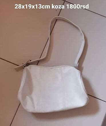 cista koza broj: Bela kožna torbica sa ručkom na rame. Dimenzije: 28 x 19 x 13 cm na lalafo.rs — 1 cista koza broj: Bela kožna torbica sa ručkom na rame. Dimenzije: 28 x 19 x 13 cm — 1