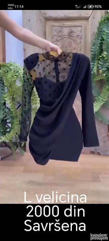 Elegantna crna mini haljina sa dugim rukavima. Gornji deo je od na lalafo.rs Elegantna crna mini haljina sa dugim rukavima. Gornji deo je od