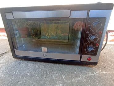 Mali šporet sa slike, dimenzije dužina 55 cm širina 36 cm visina 34 na lalafo.rs Mali šporet sa slike, dimenzije dužina 55 cm širina 36 cm visina 34