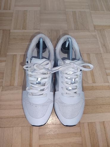 Patike Calvin Klein sa platformom u beloj boji sa srebrnim detaljima na lalafo.rs — 1 Patike Calvin Klein sa platformom u beloj boji sa srebrnim detaljima — 1