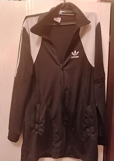 Original Adidas duks ili kao jaknica
Veličina L ali više je za M na lalafo.rs Original Adidas duks ili kao jaknica
Veličina L ali više je za M