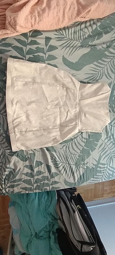 Elegantna kratka haljina bez bretela, u nežnoj svetloj nijansi sa na lalafo.rs Elegantna kratka haljina bez bretela, u nežnoj svetloj nijansi sa