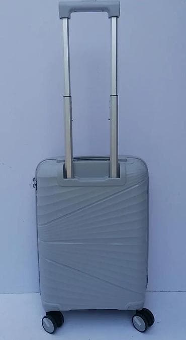 dve suknje po: Tvrdi kofer na točkiće – kabinski format - Materijal: otporna at lalafo.rs — 4 dve suknje po: Tvrdi kofer na točkiće – kabinski format - Materijal: otporna — 4