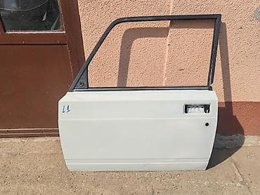 Vrata prednja leva Lada 2107 Riva,2104 Karavan,2105 br.1 U beloj boji na lalafo.rs Vrata prednja leva Lada 2107 Riva,2104 Karavan,2105 br.1 U beloj boji