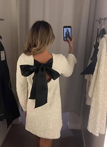 Šljokičasta mini haljina s mašnom na leđima - Kroj: ravna mini na lalafo.rs — 1 Šljokičasta mini haljina s mašnom na leđima - Kroj: ravna mini — 1