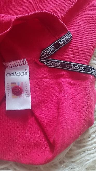 kom sa etiketom: Adidas Originals polo majica - Model: klasična polo majica sa kragnom at lalafo.rs — 3 kom sa etiketom: Adidas Originals polo majica - Model: klasična polo majica sa kragnom — 3