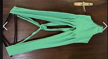 Zeleni ženski bodi sa dubokim V izrezom. Model bez rukava, sa širokim na lalafo.rs — 2 Zeleni ženski bodi sa dubokim V izrezom. Model bez rukava, sa širokim — 2