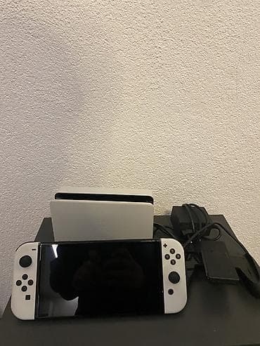 Nintendo Switch OLED (belo izdanje) - Konzola sa 7" OLED ekranom za na lalafo.rs Nintendo Switch OLED (belo izdanje) - Konzola sa 7" OLED ekranom za