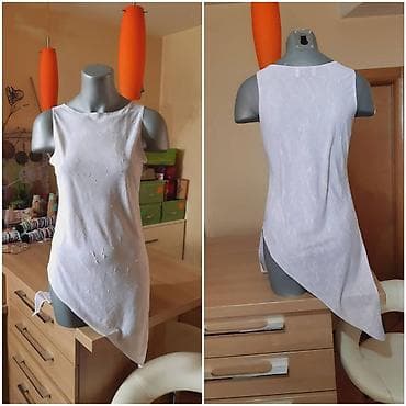 Bela ženska asimetrična majica bez rukava marke Vangi, veličine S-M na lalafo.rs — 2 Bela ženska asimetrična majica bez rukava marke Vangi, veličine S-M — 2