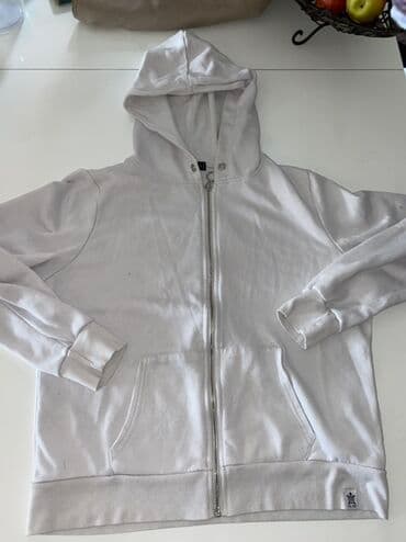 Bela dukserica sa kapuljačom i rajsferšlusom - Klasičan model na na lalafo.rs Bela dukserica sa kapuljačom i rajsferšlusom - Klasičan model na