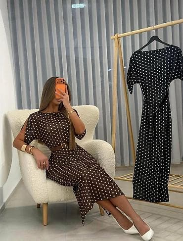 Ženska midi haljina sa tufnama - Kroj: ravna silueta do sredine na lalafo.rs Ženska midi haljina sa tufnama - Kroj: ravna silueta do sredine