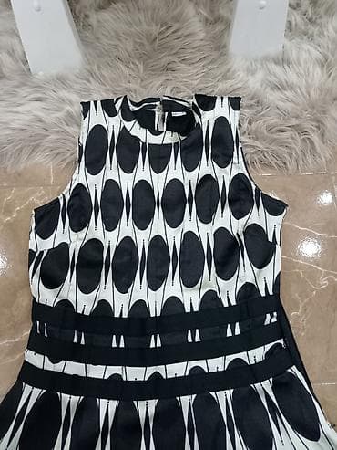 kom sa etiketom: Ženska haljina bez rukava, A‑kroja, sa okruglim izrezom. Crno‑bez at lalafo.rs — 4 kom sa etiketom: Ženska haljina bez rukava, A‑kroja, sa okruglim izrezom. Crno‑bez — 4