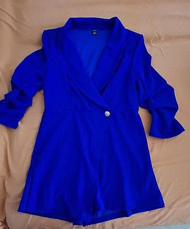 Elegantni ženski kombinezon u kobalt plavoj boji. Model inspiriše sako na lalafo.rs Elegantni ženski kombinezon u kobalt plavoj boji. Model inspiriše sako