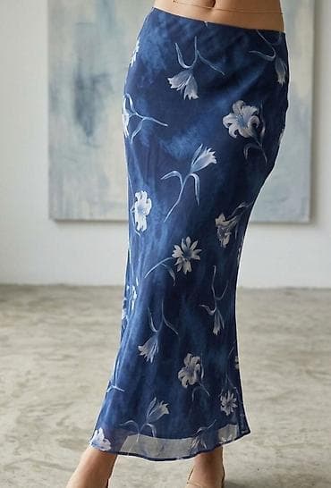 Svilena midi suknja sa cvetnim printom - Kroj: ravna, blago A-linija na lalafo.rs Svilena midi suknja sa cvetnim printom - Kroj: ravna, blago A-linija