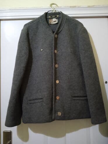 Visokokvalitetan i skupocen nemački vintage džemper od čiste vune na lalafo.rs Visokokvalitetan i skupocen nemački vintage džemper od čiste vune