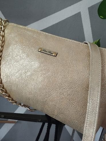 eko koza sa: Ženska zlatna kožna torba. Potpuno nova na lalafo.rs — 1 eko koza sa: Ženska zlatna kožna torba. Potpuno nova — 1