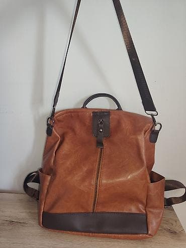 Torba/rančić od eko-kože, toplo braon boje sa tamno braon detaljima at lalafo.rs — 1 Torba/rančić od eko-kože, toplo braon boje sa tamno braon detaljima — 1