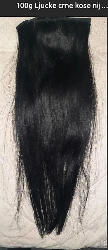100 g prirodne ljudske crne kose – nežnirana, ravna tekstura. Snop je at lalafo.rs 100 g prirodne ljudske crne kose – nežnirana, ravna tekstura. Snop je