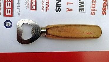 Vintage Coca Cola otvarač za flaše sa drvenom drškom. u Coca Cola na lalafo.rs Vintage Coca Cola otvarač za flaše sa drvenom drškom. u Coca Cola